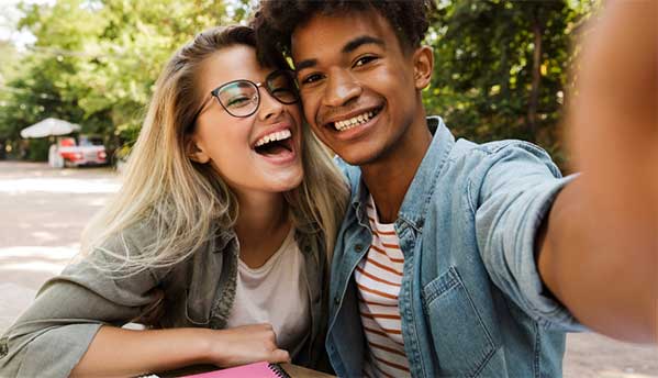 Two young people taking a selfie together